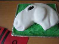Create the oval eye from black fondant. From small...