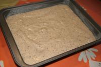 Pour the dough onto a greased baking sheet...