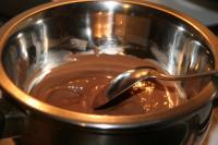 Melt cooking chocolate in a water bath. Set aside...
