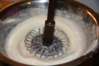 Stir vanilla custard powder in a part of used...