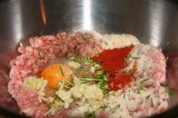 Add salt, all of spices, pressed garlic, egg,...
