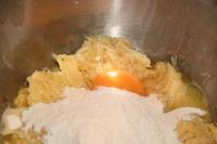Add salt, egg and flour medium. Mix to combine and...