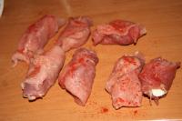 Carefully roll the cutlets, fix the scroll with...