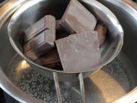Melt chocolate over a water bath. ...