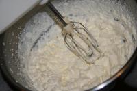 We whisk the sour cream by electric beater until...