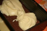 Place aluminium foil in the prepared form, grease...