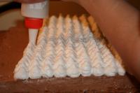 We sprinkle the egg white foam on the surface of...