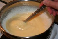 Put aside part of the cold milk and heat the rest....