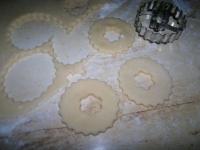 Cut the dough with forms of different shapes, so...