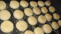 Place them on greased baking tin, brush with...