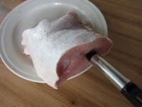 Wash the pork loin and dry it. Use a knife with...