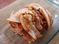 Place the meat in the baking tin, pour water in,...