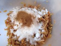 Pour sugar, cinnamon over the apples and mix. ...