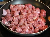 Pour the oil in a hot skillet and let the meat...