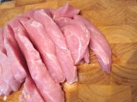 Wash the turkey meat and cut into slices....