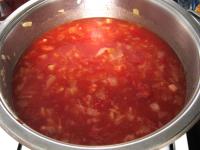 Pour in tomato puree into the cabbage, add...