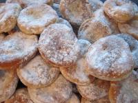 Mix to combine powdered and vanilla sugar and coat...