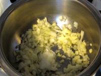 Peel the onion and finely chop. In a saucepan melt...