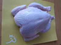 Wash chicken and season with salt both inside and...