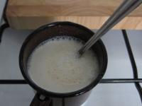 Dissolve gelatin in milk over a very gentle heat....