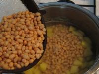 Pour drained cannellini sterilised beans into the...