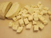 Cut dumpling into equal small cubes. ...