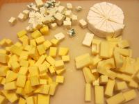 Cut different types of cheese into smaller cubes...