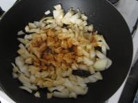 Clean the onion, cut and stew in oil covered for 5...