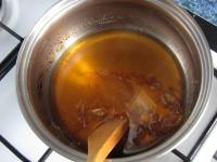 Add water and mix until caramel is melted. ...