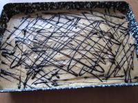Melt chocolate and sprinkle to the top of filling....