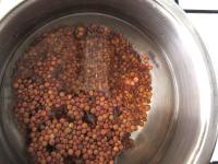 Sort out lentils and soak them in water for half...