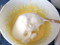 Add stiff foam whisked from egg whites. ...