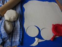 We thinly (2 mm) roll the dough loaf on the...