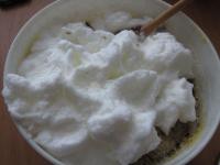 We lightly mix in the snow from the egg whites....