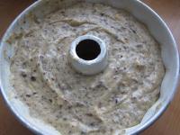 We pour out the dough to the ready oiled and flour...