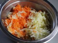 Finely grate carrot and apple into a bowl....
