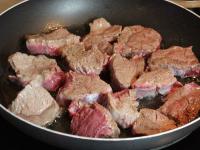 Put the meat in a hot deep pan with a little oil...
