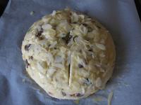 Spread the loaf with the egg that was aside,...