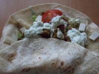 Fold bottom edge of tortilla toward the inside,...