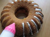 Decorate the finished bundt cake with white...