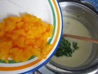 Add chopped chive to the soup and a piece of...
