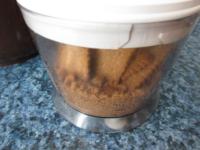 We mill the biscuits finely. We sprinkle them into...