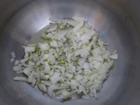 Peel onion and chop it finely. Slightly cook it in...