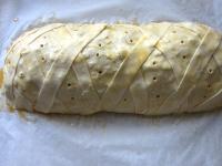 Brush the whole meatloaf with beaten egg and place...