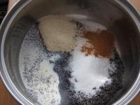 Pour warm milk over the ground poppy seeds, sugar,...
