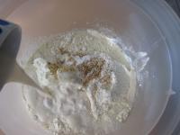 Stir fresh yeast and 1/2 teaspoon of sugar in a...