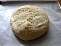 Transfer the mazanec on a baking tin lined with...