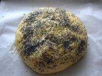 Brush the whole loaf with beaten egg, sprinkle...