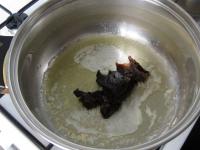 Melt the butter in a pot and add the plum jam....