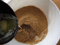 Finely crush the cookies with a rolling pin or...